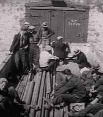 Image of hobos on a train bed